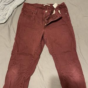 Slimming skinny maroon jeans